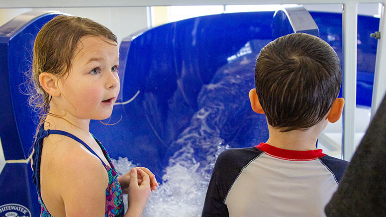 kids-at-top-of-water-slide