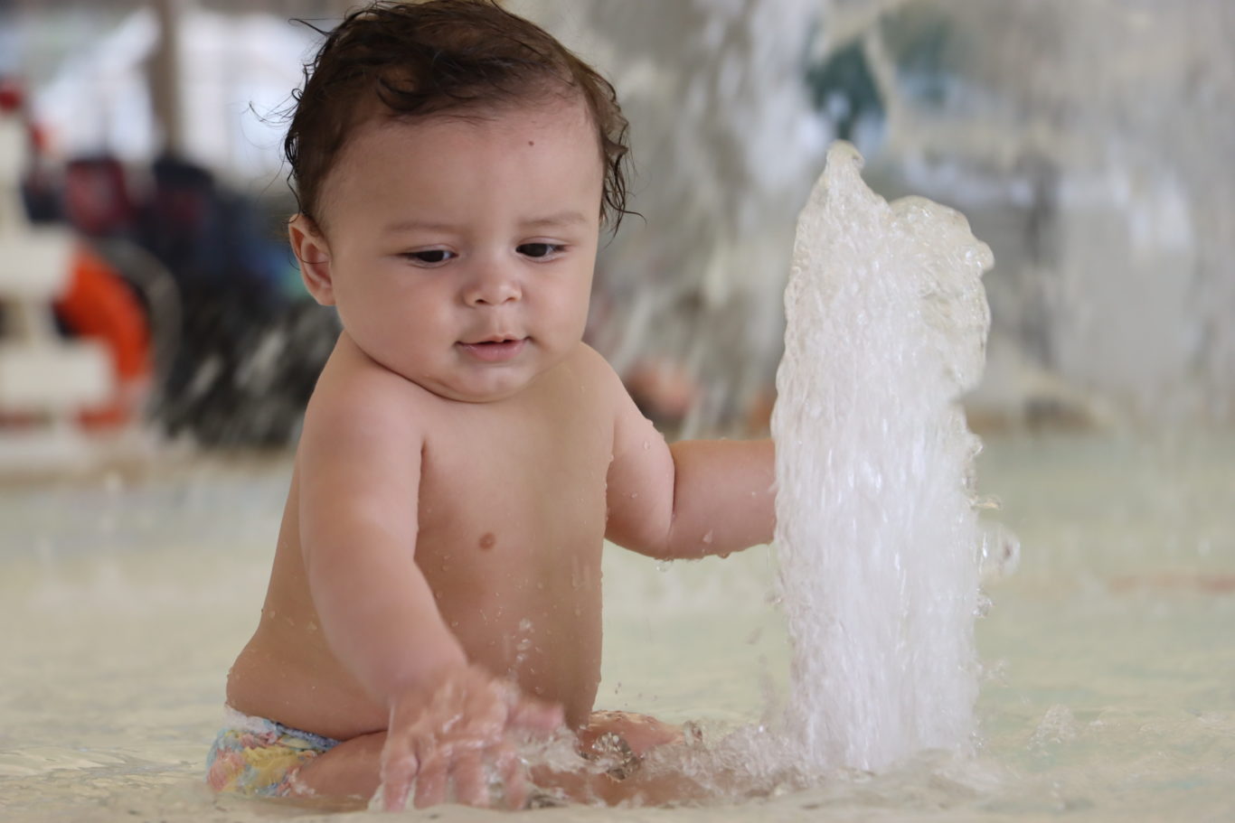 Baby Playing in Water